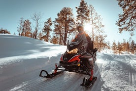 Snowmobile Safari with Ice Fishing and Outdoor Lunch in Levi