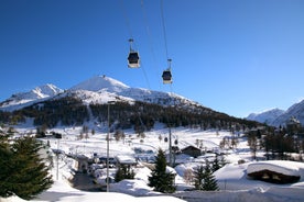 photo of panoramic view of Sestriere village from above, famous ski resort in the Italian western Alps, Piedmont, Italy.