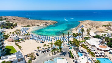 Photo of panoramic aerial view of Kalamis beach and bay in the city of Protaras, Cyprus.