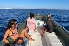 Inflatable boat excursion in the crystal clear sea of Cagliari Prosecco