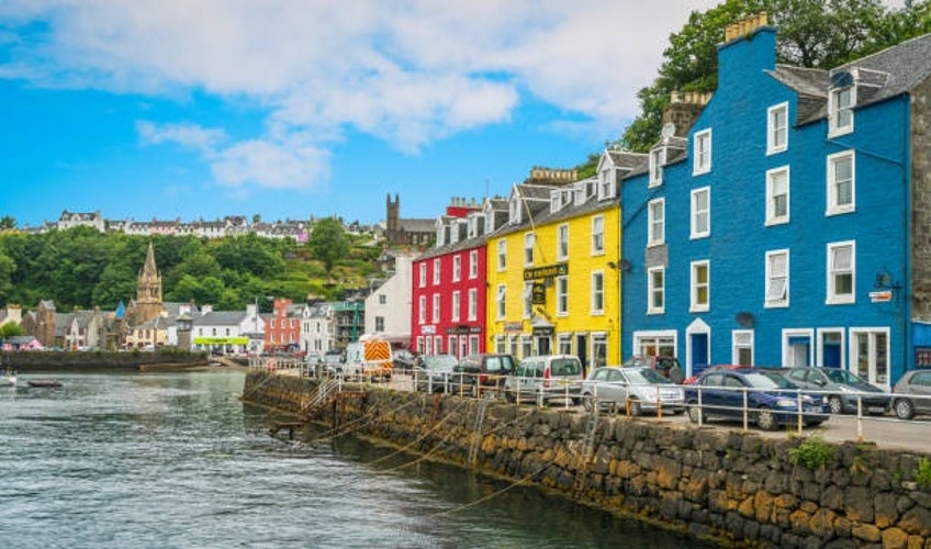 Colorful houses lining the waterfront of Tobermory on a bright summer day.jpg