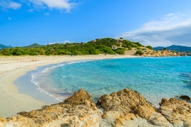 Photo of aerial view of a beautiful bay with azure sea from top of a hill, Villasimius, Sardinia island, Italy.