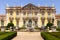 Photo of Facade and garden of Queluz National Palace with Neptune's fountain, in Sintra, Lisbon district, Portugal.