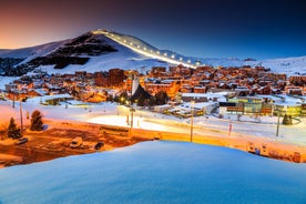 Photo of aerial view of spectacular winter landscape and mountain ski resort in French Alps ,Alpe D Huez, France.