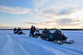 Snowmobile and Ice Fishing Experience