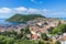 Photo of sunny view of Angra do Heroismo from Alto da Memoria, Terceira, Azores, Portugal.