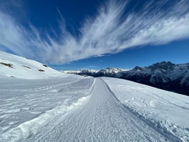 Photo of  beautiful Scuol town in Swiss Alps and Inn river, Switzerland.