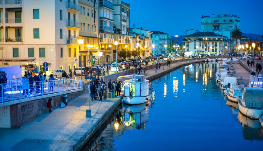 Boats along city canal on a beautiful winter evening.