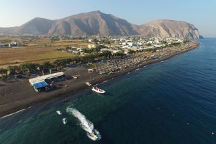 Photo of aerial view of Akrotiri Village in Santorini, Greece.