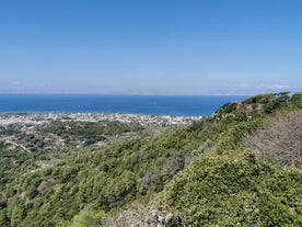 Photo of aerial view of seaside village of Archangelos in Laconia, Greece.