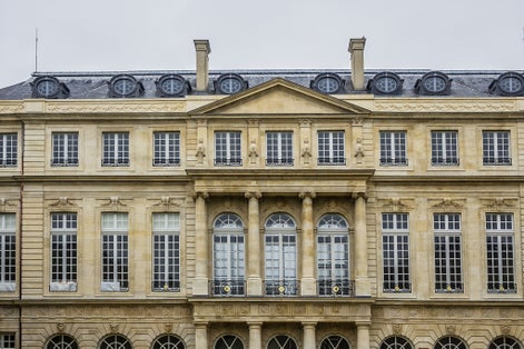 photo of External view of Archives Nationals (National Archives) buildings (old neo-classical mansion, the Hotel de Rohan-Soubise, 1705). District of Le Marais, Paris, France.