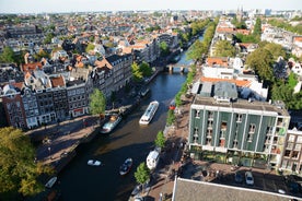 Amsterdam Netherlands dancing houses over river Amstel landmark in old european city spring landscape.