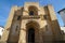 west facade of old romanesque cathedral in Coimbra.