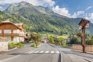 photo of French alps mountain and Saint-Gervais-les-Bains village, in spring in France.