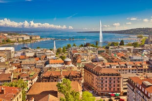 View of the Old Town of Basel with red stone Munster cathedral and the Rhine river, Switzerland.