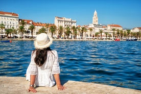 photo of a beautiful panoramic view of Kastel Luksic harbor and landmarks summer view, Split region of Dalmatia, Croatia.