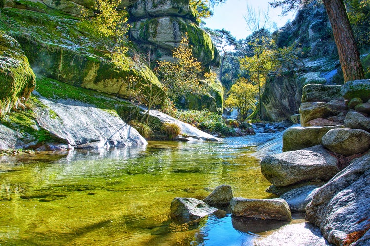 photo of  view of The Eresma River as it passes through the area of La Boca del Asno, in the Royal Site of San Ildefonso, Segovia (Spain).