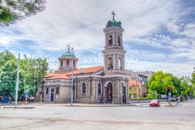 Photo of aerial view of The Cathedral of the Assumption and Varna city at amazing sunset, Bulgaria.