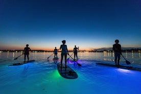 Excursão noturna de stand-up-paddle Glow em Pula