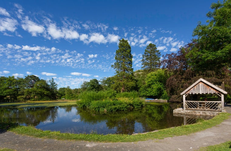 Photo of Summer scene at the main lake at Craig y Nos Country park in the Swansea Valley, South Wales UK.