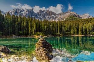 photo of skiing in the Alpe di Siusi with snow in winter, Dolomites, Italy.