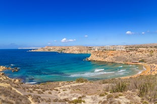 Photo of attractive view of Golden bay in village Manikata on a sunny day, north-west coast of Malta island.