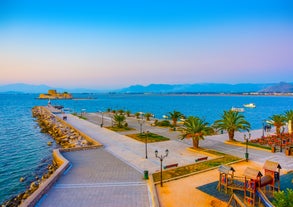 Photo of a small island with a fortress at the coast of Nafplio ,Greece.