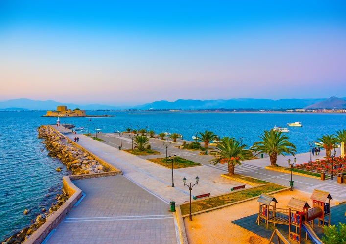 Photo of view of the port of Nafplio city in Greece at beautiful sunset.