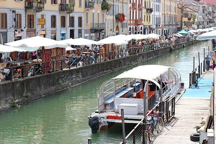 Busy summer scene along Naviglio Grande in Milan, Italy.jpg