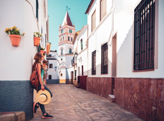 Woman tourist in spanish street- Andalusia, malaga province.jpg