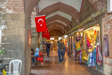 Silk shops that sell silk clothes, shawls and clothes in Koza Han Silk Bazaar. Koza Han is historical place from Ottoman.