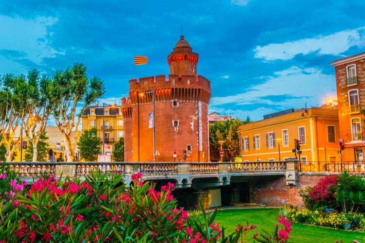 Photo of Castillet tower hosting a museum of history and culture in Perpignan, France.