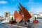 Photo of fountain depicting Galway Hookers in Eyre Square with Browne doorway in background in Galway, Ireland.