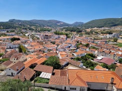 Photo of aerial view of Alcobaca Monastery and the city in Alcobaca, Portugal.