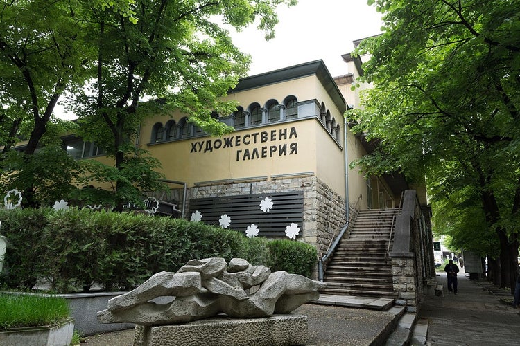 Photo of Stara Zagora's Art Gallery - the former building of city market hall. The words - Art Gallery - are written in Cyrillic on the building, Bulgaria.