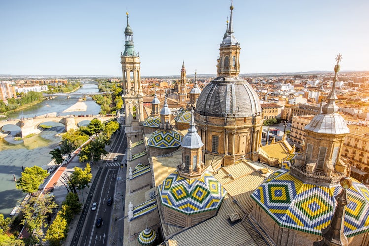 Aerial cityscape view on the roofs and spires of basilica of Our Lady in Zaragoza city in Spain.jpg