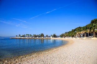 Photo of panorama and landscape of Makarska resort and its harbour with boats and blue sea water, Croatia.