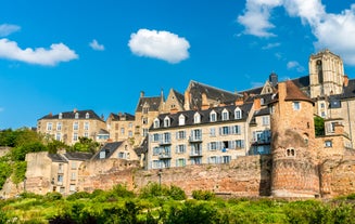 Photo of traditional half-timbered houses in the old town of Rennes, Brittany, France.