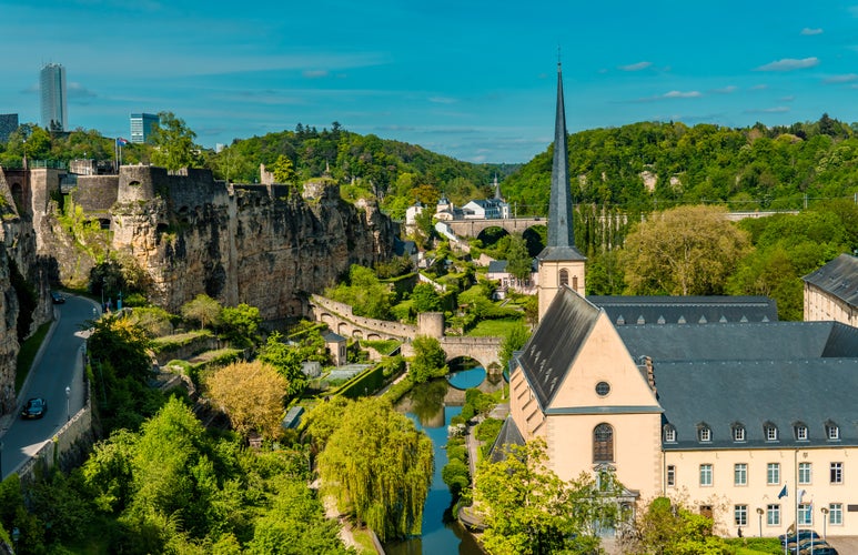 Photo of aerial panorama view of Luxembourg-City lower town with park and Neumünster abbey.