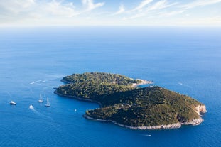 Photo of panoramic aerial view of the old town of Dubrovnik, Croatia seen from Bosanka viewpoint on the shores of the Adriatic Sea in the Mediterranean Sea.