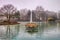 photo of the public parc de merl in luxembourgh city, Luxembourg, taken in spring 2018. It features a lake where a fountain is flowing and a hutch for ducks to have shelter.