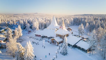 Rovaniemi Finland, panorama of the city with Kemijoki river in the back and Ounasvaara fell with the city heart at the left.