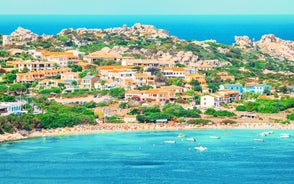 Photo of Bizarre granite rock and azure bay in beautiful beach at Capo Testa, Sardinia, Italy.