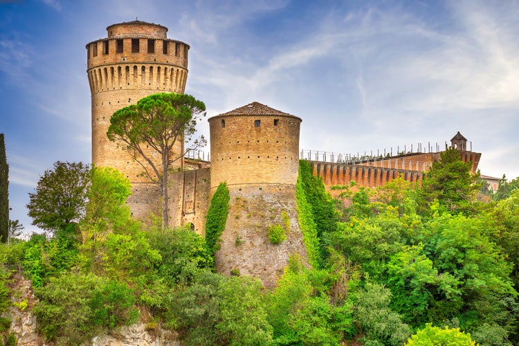 photo of view of Brisighella, Ravenna, Emilia-Romagna, Italy, Ravenna, Emilia-Romagna, Italy. Beautiful panoramic aerial view of the medieval city and Manfredian fortress with clock tower. Famous symbols