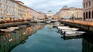 Photo of Trieste lighthouse Phare de la Victoire and cityscape panoramic aerial view, Friuli Venezia Giulia region of Italy.