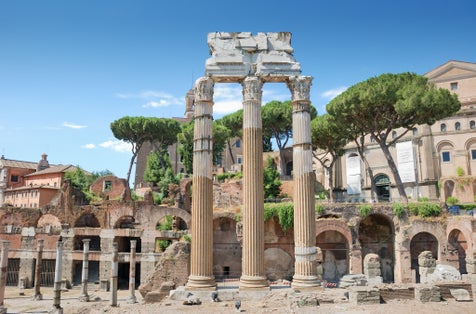PHOTO OF The 3 columns Corinthian order of the temple of Castor and Pollux (Tempio dei Dioscuri) is an ancient edifice in the Roman Forum, Rome, Italy.