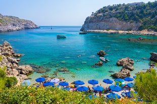 Photo of panoramic aerial view of Lindos bay, village and Acropolis, Rhodes, Greece.