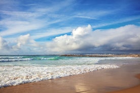 Photo of aerial view of Costa da Caparica coastline of glorious sandy beaches, powerful Atlantic waves, Portugal.