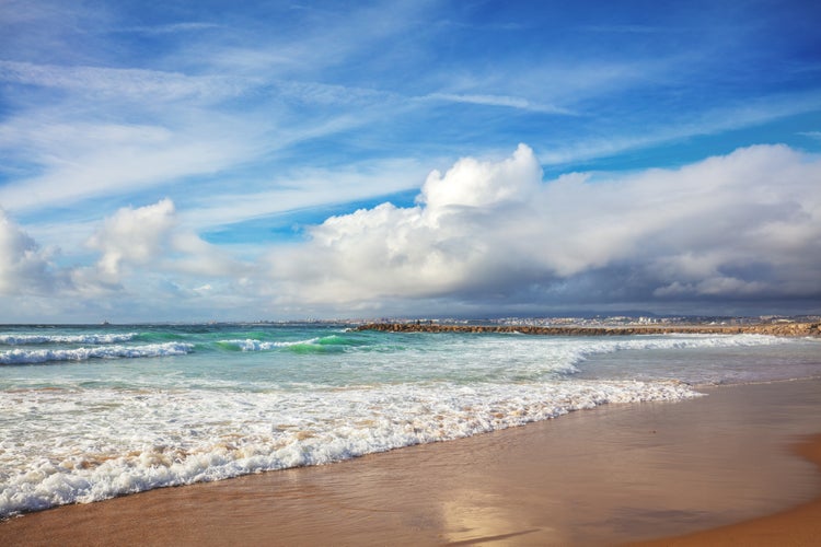 Photo of beautiful beach in Costa Caparica, Almada, Portugal.