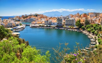 Photo of aerial view of the port in Agios Nikolaos, famous travel destination of Crete, Greece.